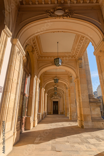 A view of the outer doorway passage of the Museum of Romanian History during the afternoon.