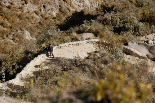 men travelin on matain trail