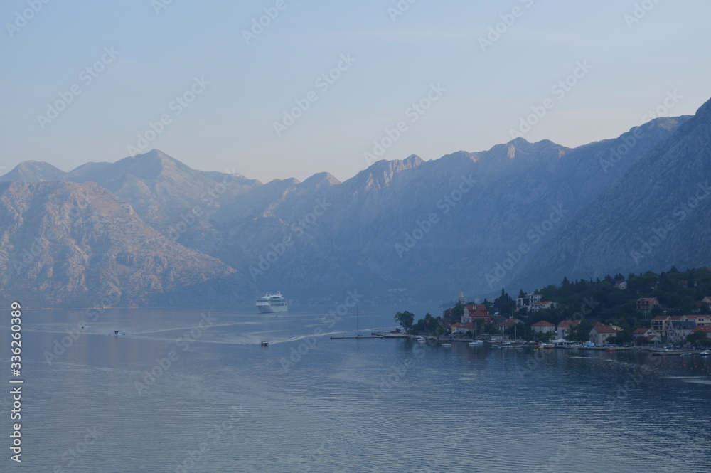 Mountainous Valley Surrounding The Adriatic And Cruise Ship