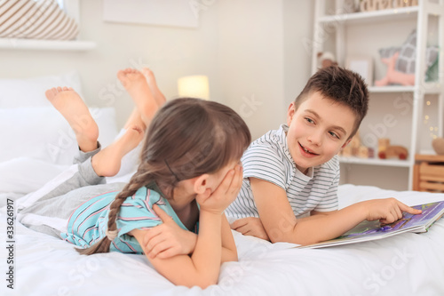 Little children reading bed...