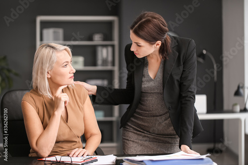 Woman calming her fired mat...