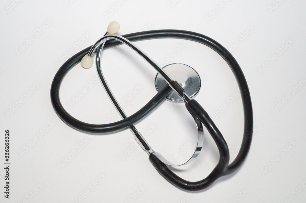 Black new stethoscope on white background Black new stethoscope on white background