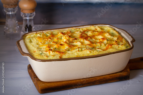 Fotografie Creamy fish pie or fisherman's pie - traditional British and Irish dish
