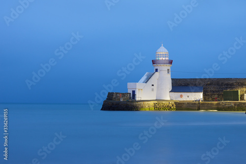 Lighthouse in Balbriggan, Ireland calm water, long exposure blue hour