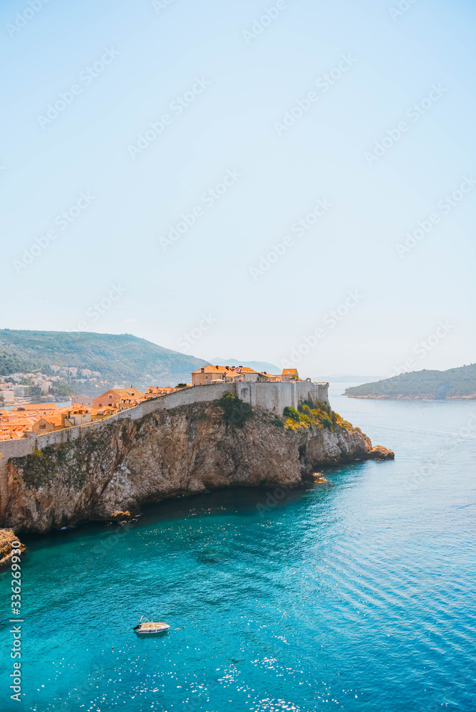 View of the coast of the mediterranean sea and Dubrovnik old city wall