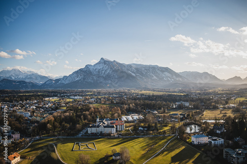 panoramic view of the city of salzburg, snowy mountains and a full sunny day © Agustín