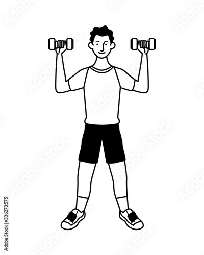 young man athlete lifting dumbbells