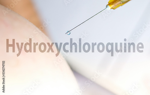 Patient getting Hydroxychloroquine vaccine, Novel corona virus sars cov 2 concept photo