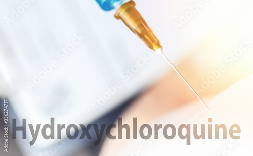 Patient getting Hydroxychloroquine vaccine, Novel corona virus sars cov 2 concept photo