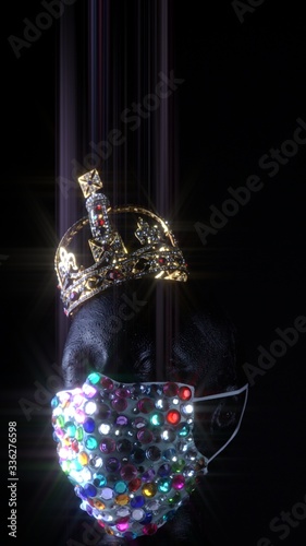 Urban medical mask and gold crown on the woman mannequin. Kinky expensive diamond accessory for celebrity model during virus disease COVID-19  coronavirus pandemic self isolation.