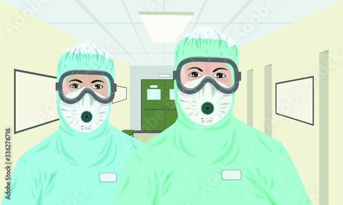 two medics in protective suits with respirators against the background of the hospital corridor