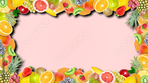 Creative photo of many different exotic tropical bright fruits frame with shadows on a summer soft pink color background. View from above. Bright summer fruit pattern with copy space.
