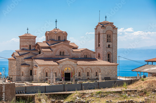 OHRID, NORTH MACEDONIA - AUGUST 21, 2019: peopleundertheChurch of SaintsClementandPanteleimon photo