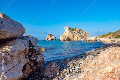 Cyprus. Rock Aphrodite. Cliffs on the beach of Cyprus. Aphrodite's stone on the background of blue sky. Tour the Mediterranean Sea. Rocks on the ocean. Scenery. Attractions in the vicinity of Paphos