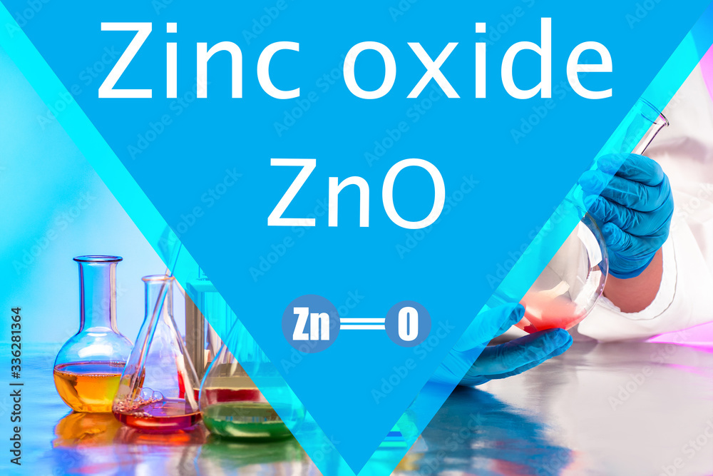 Zinc oxide. ZnO. Lab technician holds a test tube with liquid. Test