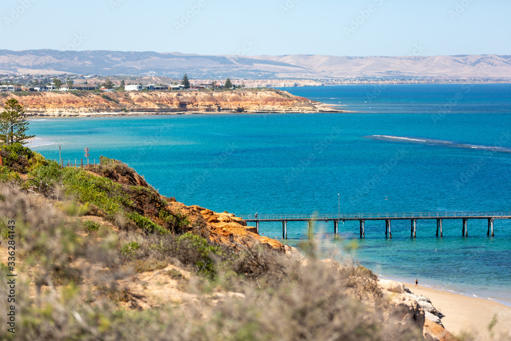 The iconic Port Noarlunga jetty and rock formations at Southport South Australia on 30th January 2020