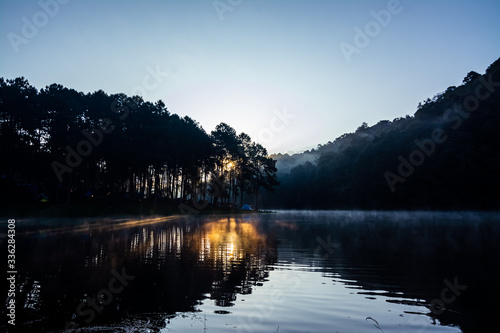 The landscape of the reservoir and the morning fog