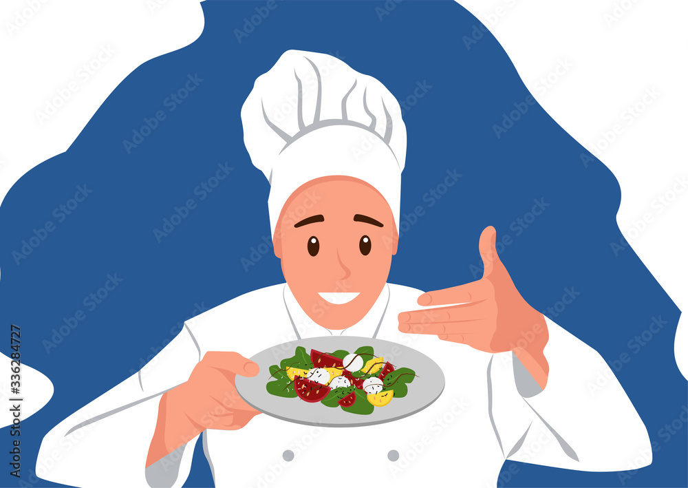 Smiling Chef is holding a Salad and sniffing him Smiling Chef is holding a Salad and sniffing him