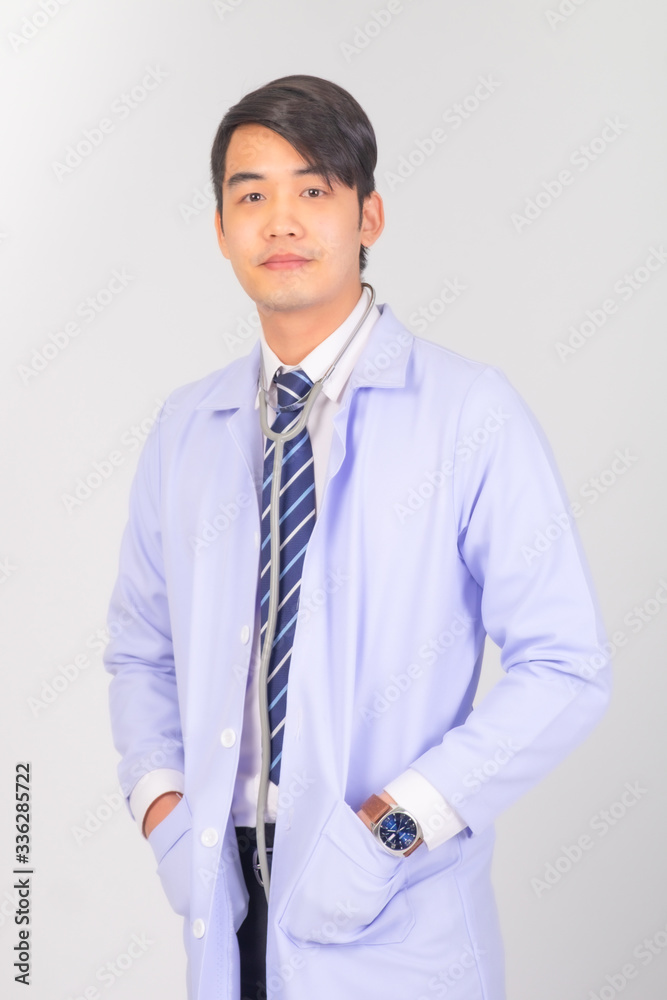 portrait medical doctor in white uniform on gray background, medical concept portrait medical doctor in white uniform on gray background, medical concept