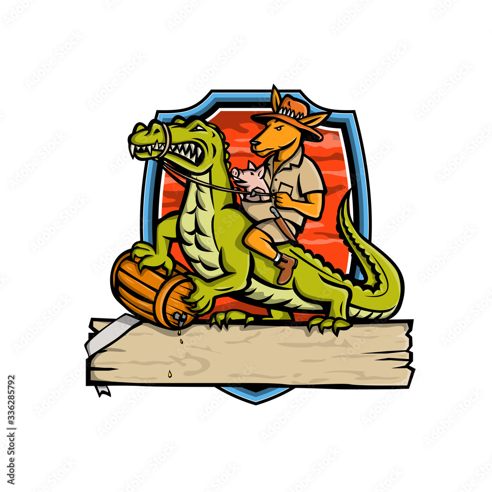 Mascot icon illustration of a Australian outback kangaroo with pig in pouch riding a crocodile or croc holding a beer barrel set inside shield or crest isolated background in retro style.