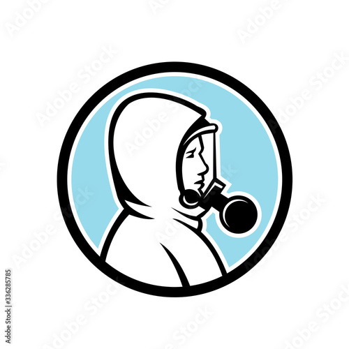 Mascot icon illustration of a healthcare worker, medical professional, nurse or industrial worker wearing a respiratory protective equipment, RPE viewed from side set in circle done in retro style.