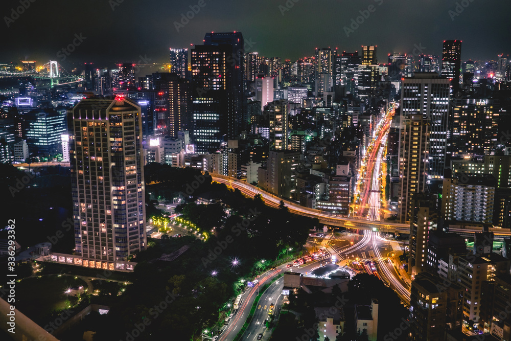 Panoramic view of Tokyo skyline, traffic and light by night from Tokyo Tower Observation Deck, Japan