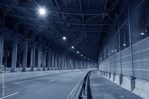 Empty tunnel in the dark. Transportation background