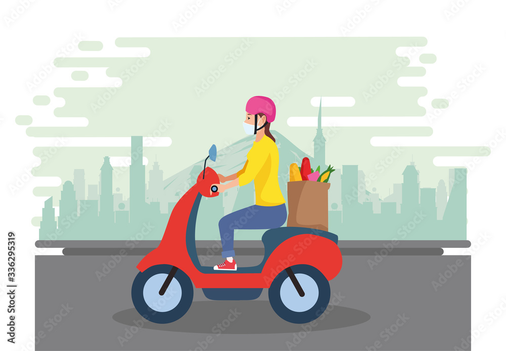 woman in motorcycle using face mask transport groceries