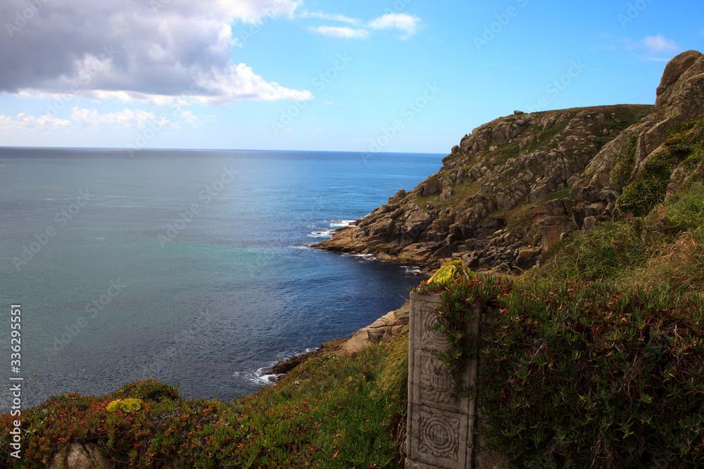 Porthcurno (England), UK - August 16, 2015: Porthcurno coastline and cliffs, Cornwall, England, United Kingdom.