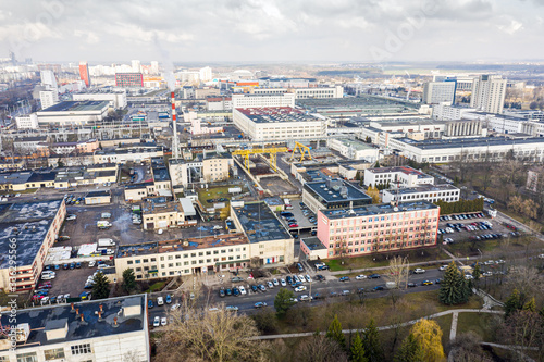 aerial top view of industrial buildings. manufacturing companies, factories and warehouses at urban industrial area