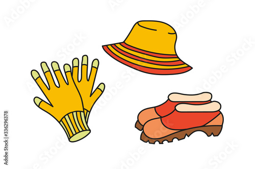 A simplified colored watering can, gloves and summer panama isolated on a white background.