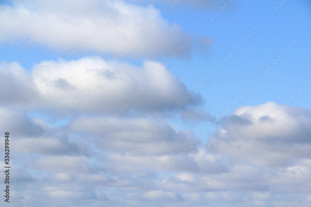 Lovely white fluffy clouds on a background of blue sky. Lovely white fluffy clouds on a background of blue sky.