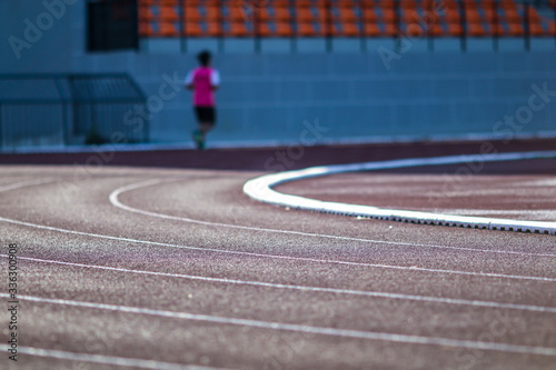 Red running sport track background and texture. Sport running track concept.