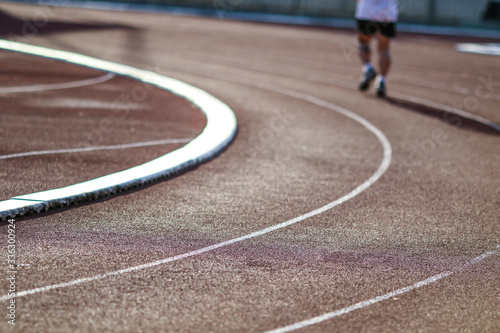 Red running sport track background and texture. Sport running track concept.
