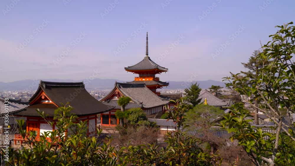 Beautiful Kiyomizu-Dera Tower With An Impressive Location Overlooking The City In Kyoto, Japan - Wide Shot Beautiful Kiyomizu-Dera Tower With An Impressive Location Overlooking The City In Kyoto, Japan - Wide Shot