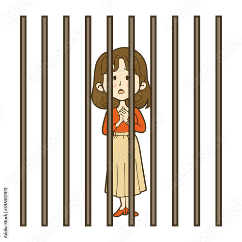 檻に入れられた若い女性