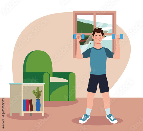man lifting dumbbells in the house