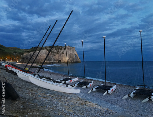 Early morning boats at Etretat beach photo
