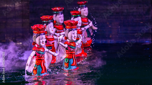 Tableau sur toile Traditional Vietnamese performance water puppet theatre show in Hanoi, Water puppetry, Hanoi, Vietnam