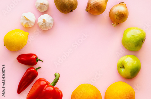 Fototapeta Naklejka Na Ścianę i Meble -  Vegetable and fruit for strengthening immunity on a colored background