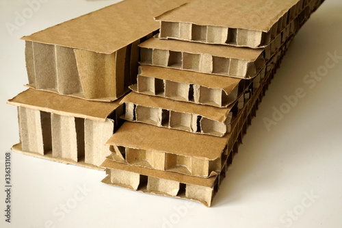 Sheets of brown corrugated cardboard used for filling in fragile parcels. photo