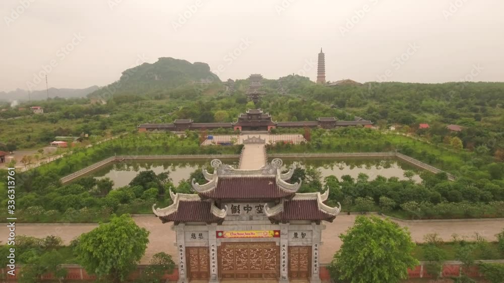 Aerial Follow Shot along Bai Dinh Temple Spiritual and Culture Complex in Ninh Binh Vietnam, the largest spiritual tourist place in Vietnam Aerial Follow Shot along Bai Dinh Temple Spiritual and Culture Complex in Ninh Binh Vietnam, the largest spiritual tourist place in Vietnam