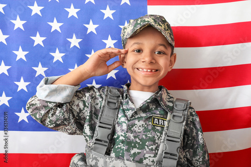 Little saluting African-Ame...
