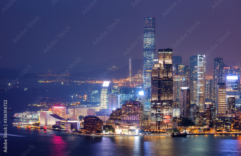 Hong Kong night view of skyline with reflections at victoria harbor