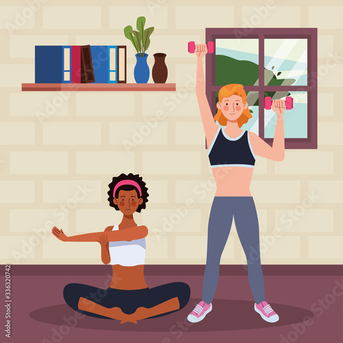 interracial women practicing exercise in the house