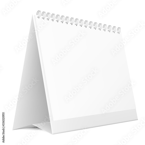 Blank desktop calendar isolated on white background. Blank desktop spiral calendar. Realistic white blank standing desk calendar with a spiral