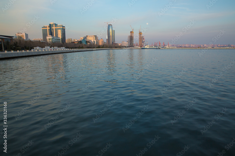 Baky skyline view from Baku boulevard the Caspian Sea embankment . Baku is the capital and largest city of Azerbaijan and of the Caucasus region.