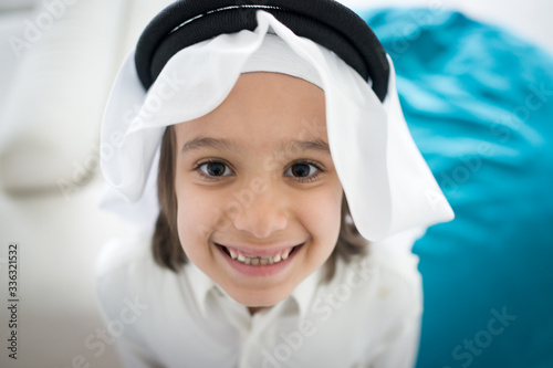 Little cute preschool Arab boy smiling portrait photo
