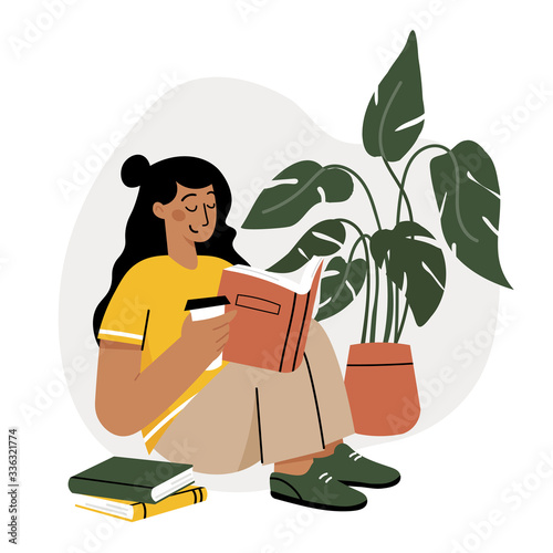 Girl reading a book and resting concept. Woman self isolation in her home 