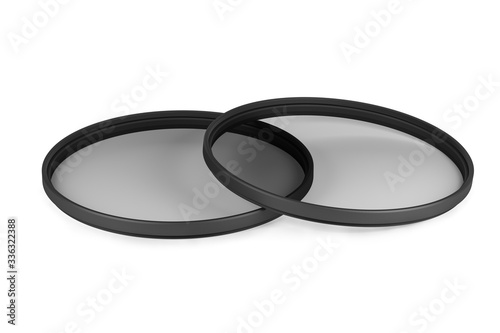Two slim neutral density or ND filters isolated on white background (3d model rendered illustration)